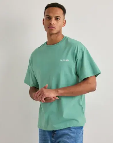Que Sera Sera Que Sera Sera Tischi T-shirt Oversized t-shirts Grønn