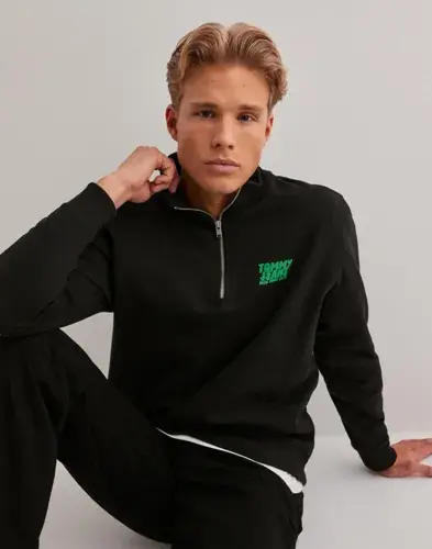 Tommy Jeans Tommy Jeans Tjm Reg Bubble Qrtr Zip Frnt/Bck Half zip Svart