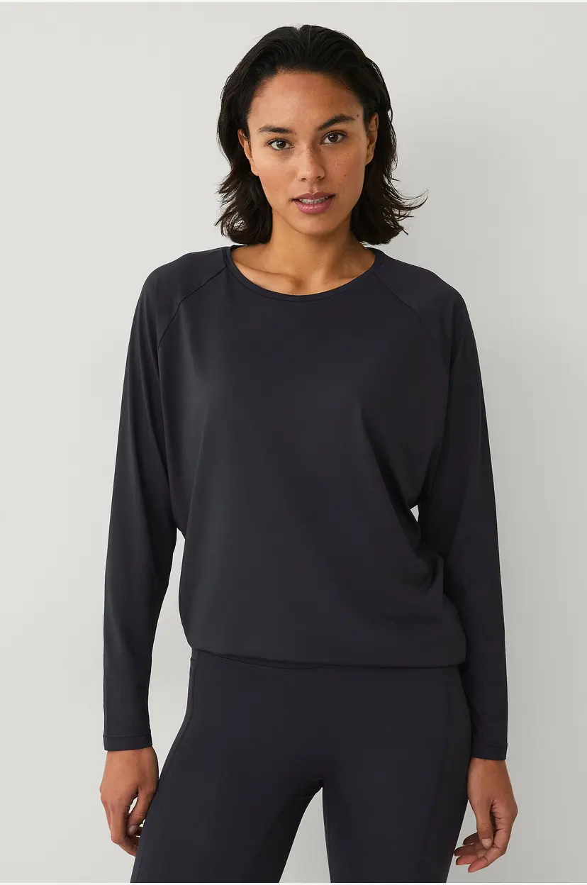 Ellos STUDIO Top Loose LS Core - Svart