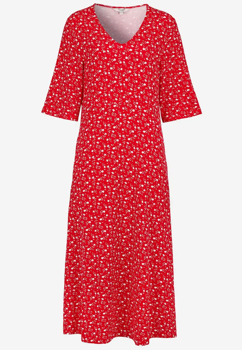Jersey-kjole med et blomstermønster og lommer