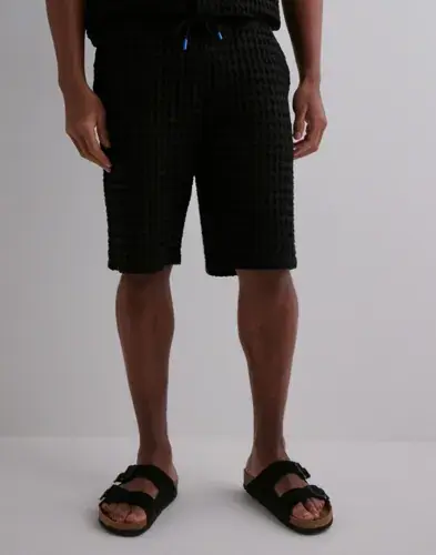 Que Sera Sera Que Sera Sera Will Waffle Shorts Shorts Svart